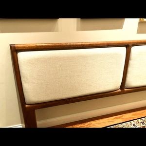 Mid Century Modern King size headboard. Walnut wood and neutral cream upholstery